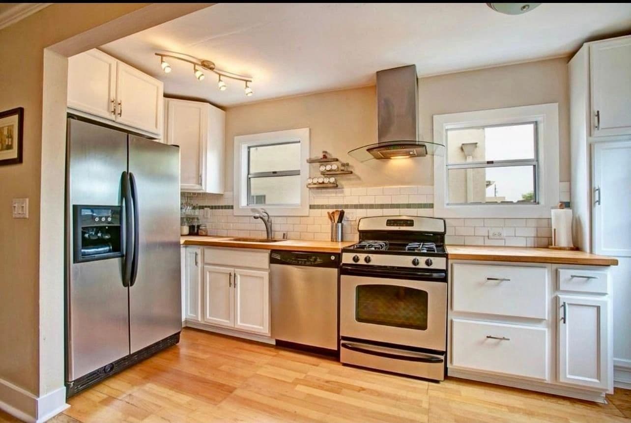 Warm wood kitchen renovation by MA Properties
